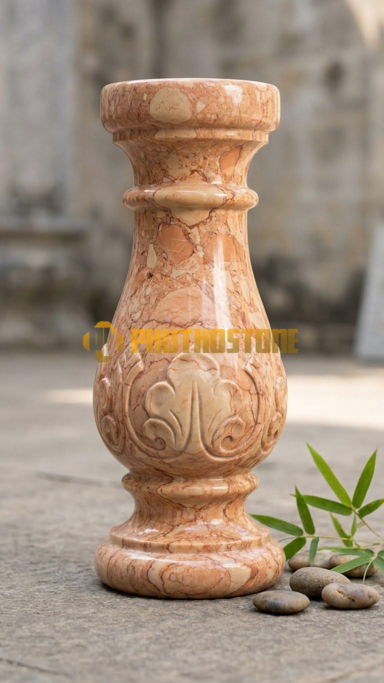 Con Tiện Đá Đá Hồng Bát Giác (8 Cạnh): Trụ hình bát quái, cao 75cm, đk 14cm, mang ý nghĩa phong thủy trấn trạch.