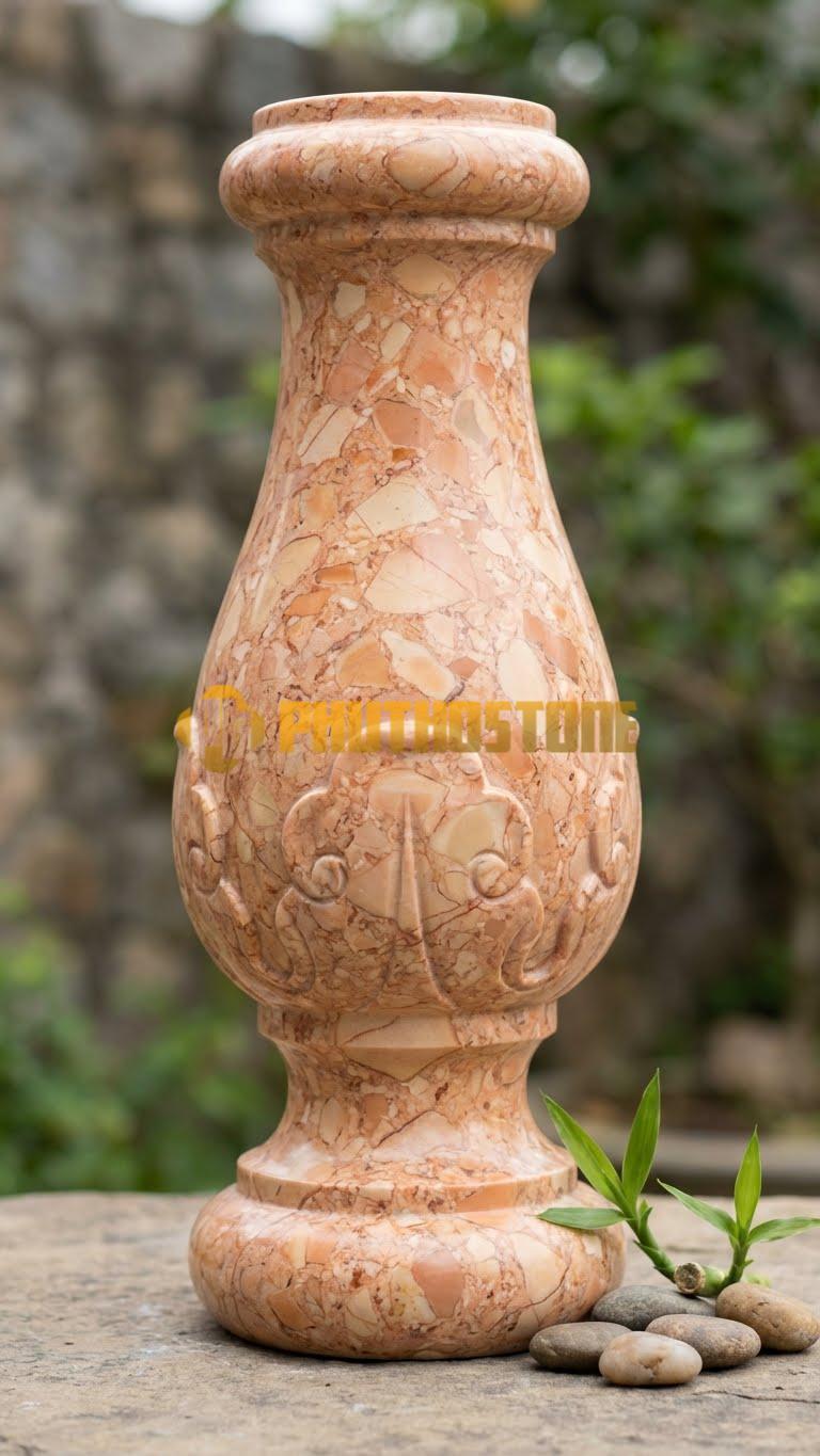 Con Tiện Đá Đá Hồng Lục Bình Truyền Thống: Dáng bình bông thắt cổ chai, cao 70cm, đường kính (đk) 12cm, bề mặt trơn đánh bóng mờ.