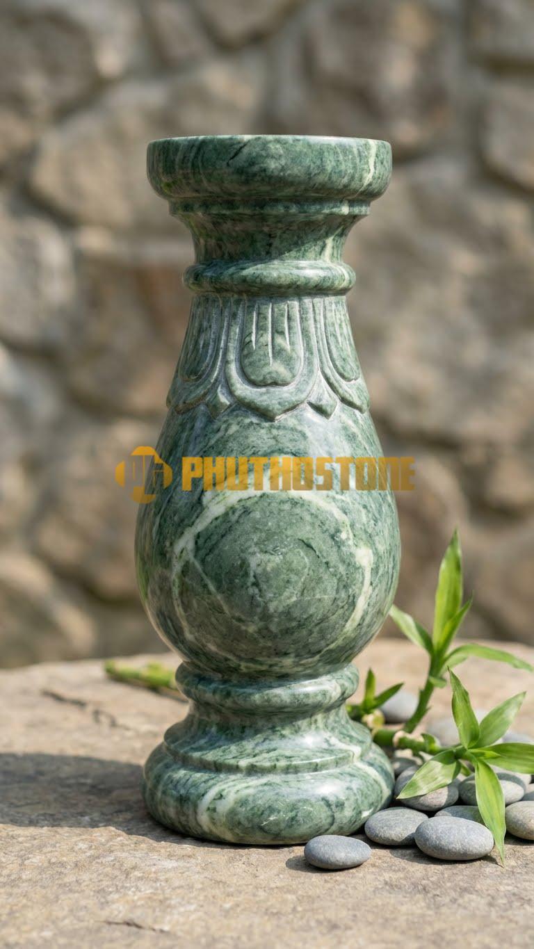 Con Tiện Đá Xanh Ấn Lục Bình Chạm Sen (Cổ): Dáng lục bình, cao 75cm, đk 14cm, phần cổ bình chạm vòng cánh sen ngửa.
