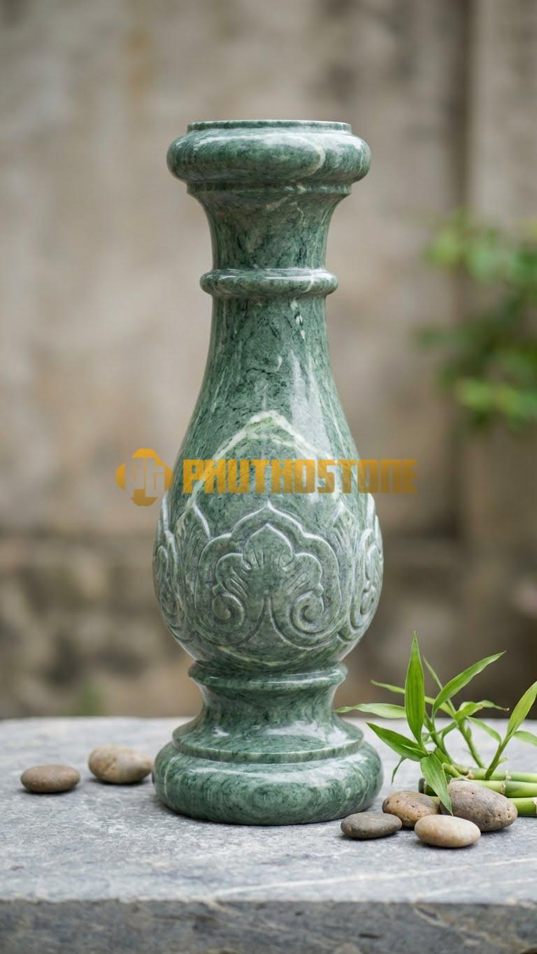 Con Tiện Đá Xanh Ấn Lục Bình Truyền Thống: Dáng bình bông thắt cổ chai, cao 70cm, đường kính (đk) 12cm, bề mặt trơn đánh bóng mờ.