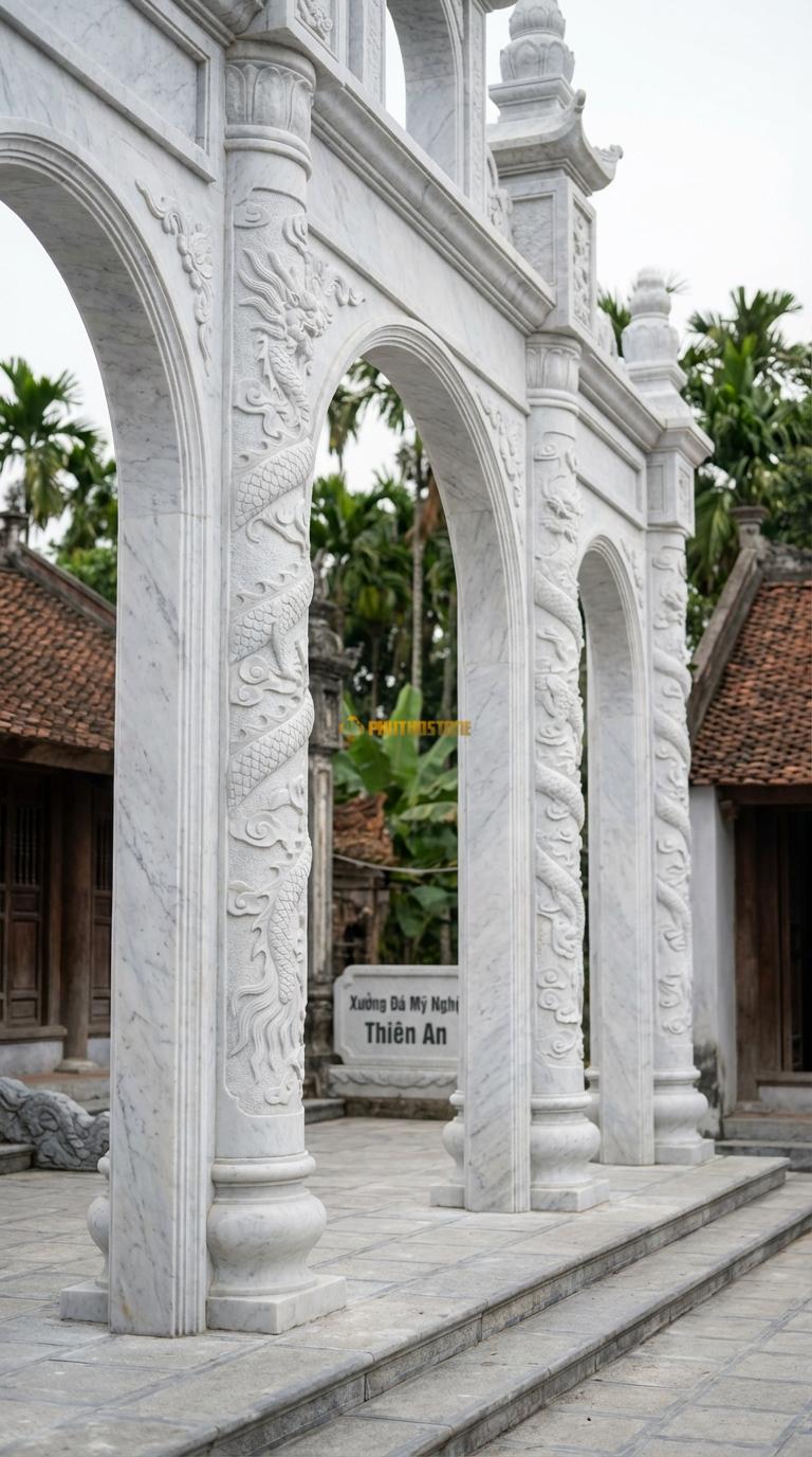 Cổng Tam Quan Đá Trắng Yên Bái Rồng Cuộn (Long Cuốn Thủy): Cột tròn chạm rồng quấn nổi 5cm. Cột tròn đường kính 40cm; Cao tổng thể 4m8
