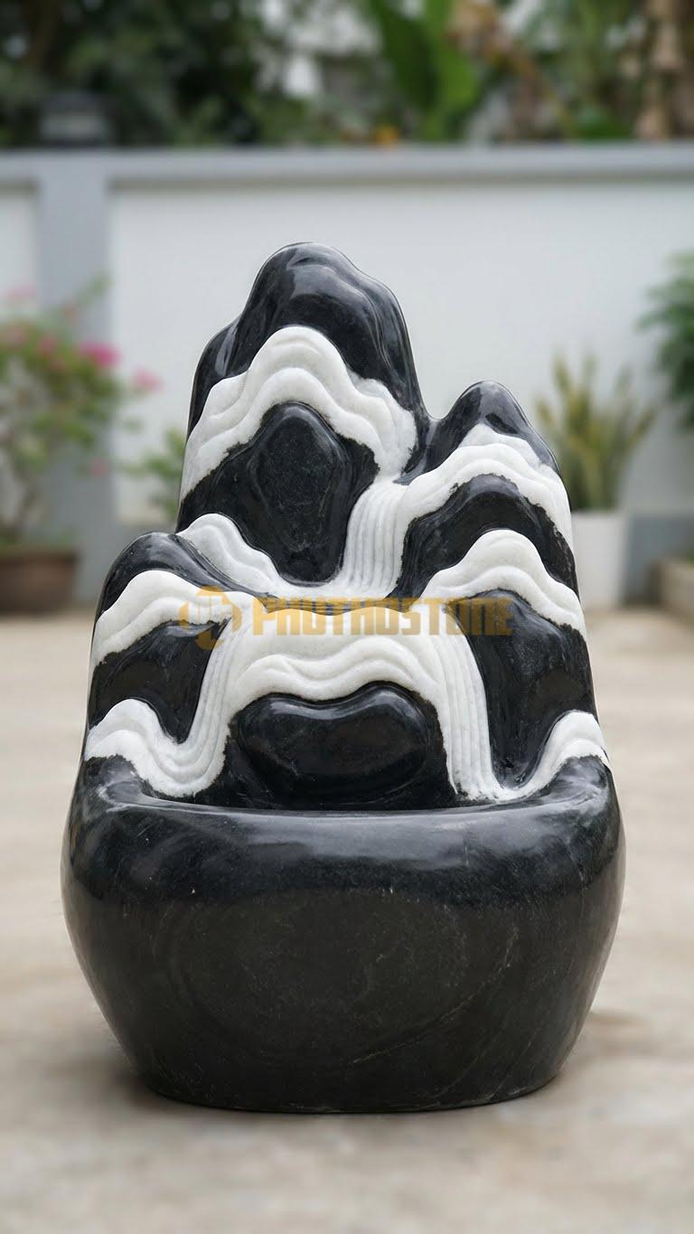 Đài phun nước đá tuyết sơn hòn non bộ